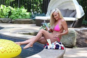 Jenny McCarthy is in a sexy bikini photoshoot at a pool in Los Angeles