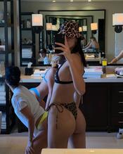 Kendall Jenner shows off her beach body in a leopard print bikini
