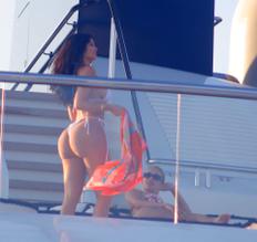 Kylie JennerSexy in Kylie Jenner seen in a stunning white bikini aboard her yacht called Tranquility, on the island of Capri