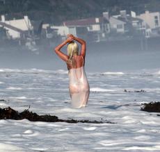 Lady Gaga wearing a bikini and thong lingerie on the beach in Malibu, California