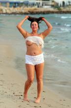 Lisa AppletonSexy in Lisa Appleton seen nude walking along the beach in Spain on 16.03.2018