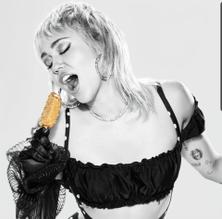 Miley CyrusSexy in Miley Cyrus Sexy Poses In Magnum Ice Cream Promo Photoshoot