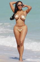 Moriah Mills Sexy in tiny gold bikini at the beach in Miami