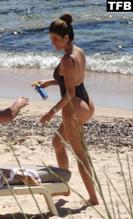 NATALIALOEWESEXYSEENFLAUNTINGHERHOTBIKINIBODYATTHEBEACHINSARDINIA - NUDE STORY