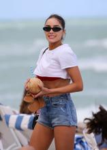 Olivia CulpoSexy in Olivia Culpo scorching hot in a bright red bikini as she joins Devon Windsor on Miami Beach