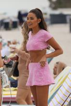 OLIVIACULPOWEARSAREVEALINGCHANELCROPTOPANDMINISKIRTOVERAWHITESTRINGBIKINIONTHEBEACHINMIAMI - NUDE STORY