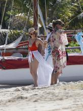 Olivia MunnSexy in Olivia Munn Sexy Red Swimsuit On the Beach in Hawaii 