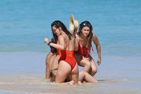 Olivia MunnSexy in Olivia Munn Sexy Red Swimsuit On the Beach in Hawaii 