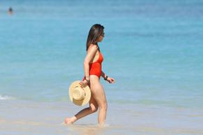 Olivia MunnSexy in Olivia Munn Sexy Red Swimsuit On the Beach in Hawaii 