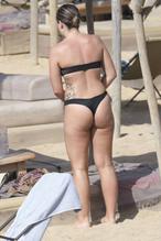 Olympia ValanceSexy in Olympia Valance Sexy and Topless at the beach in Greece with friends