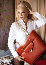 Pamela AndersonSexy in Pamela Anderson looks stunning as she models a new handbag range