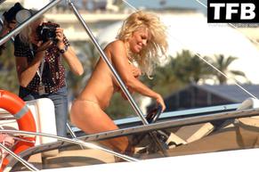 Pamela Anderson Sexy in Pamela Anderson Sexy Poses Topless In A Bikini On A Boat During A Photoshoot in Cannes