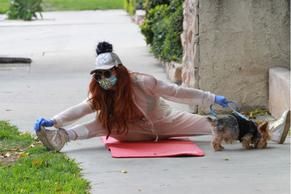 Phoebe PriceSexy in Phoebe Price seen with her dog as she sets up her yoga mat outside on the sidewall for an afternoon workout in Studio City