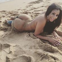 SHELLEYGOLDENTOPLESSCOVERINGBOOBONTHESAND - NUDE STORY