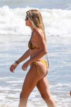 Sofia RichieSexy in Sofia Richie displays her bikini body while strolling with bf Scott Disick, a friend