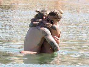 Sophia ThomallaSexy in Sophia Thomalla Sexy with German Goalkeeper Loris Karius on the beach