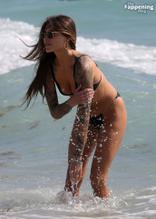 Sophia ThomallaSexy in Sophia Thomalla Sexy Spotted Showing Off Her Amazing Body Wearing a Hot Black Bikini at the Beach in Miami 