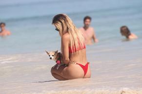 Stefanie KnightSexy in Stefanie Knight stuns in a red bikini during some downtime on Christmas in Tulum