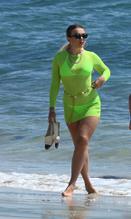 Tallia Storm shows off her bikini ready lockdown body in a green bikini in London