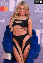 Tallia Storm Sexy Seen Flaunting Her Hot Figure In A Black Top And Cutout Trousers At The BRIT Awards in London 