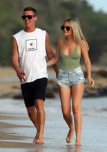 Tess StruberSexy in Tess and Luke Struber go for a beach walk with their dog Tilly in their hometown of Cairns