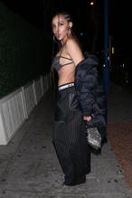Tinashe Braless shows off her toned abs while wearing a top that leaves little to the imagination