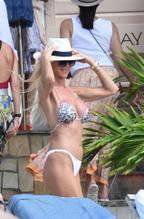 VICTORIASILVSTEDTENJOYSADAYONTHEBEACHDURINGHERYEARLYHOLIDAYINSTBARTS - NUDE STORY